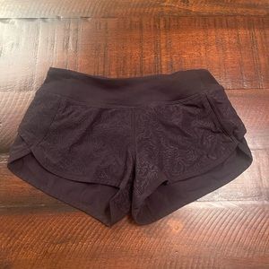 Black ivivva/ lululemon floral shorts!